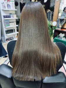 After hair smoothing service at Sanaa Ahmed Beauty Salon in New Cairo showing sleek, healthy-looking straight hair after treatment at a professional hair salon in New Cairo