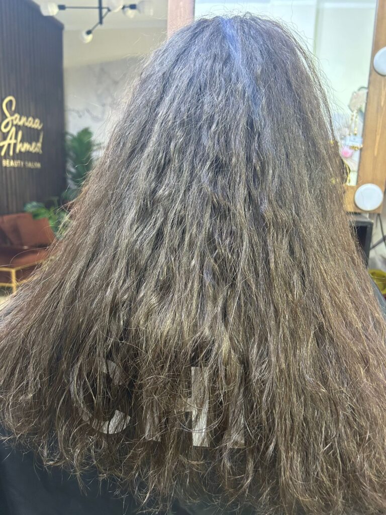IMG-20260419-WA0015 Before hair treatment service at Sanaa Ahmed Beauty Salon in New Cairo for dry frizzy hair