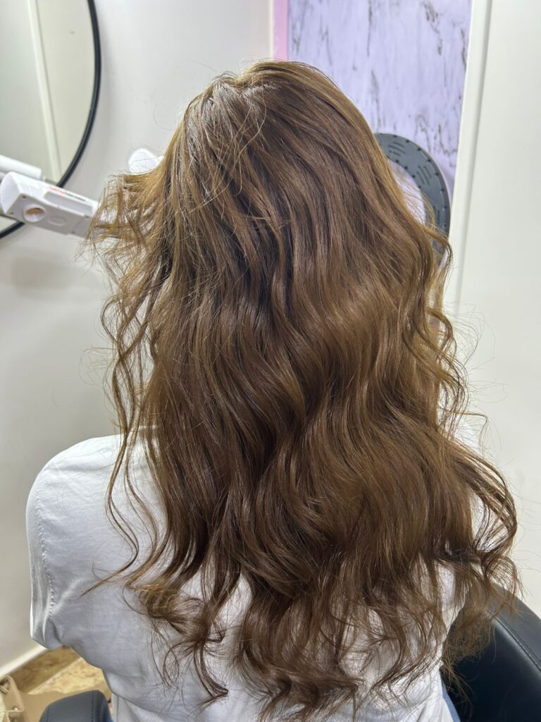 IMG-20260419-WA0039 hair coloring service at Sanaa Ahmed Beauty Salon in New Cairo for rich brown hair