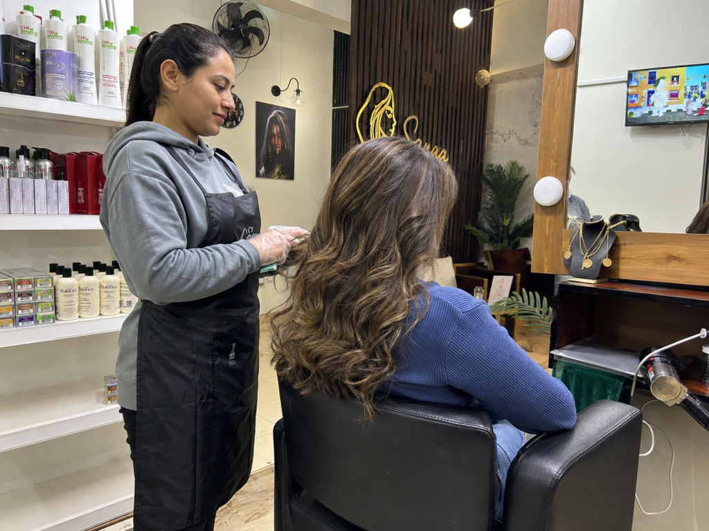 3 Hairstyling near Downtown Katameya New Cairo for weddings engagements dinners and family events at Sanaa Ahmed Beauty Salon