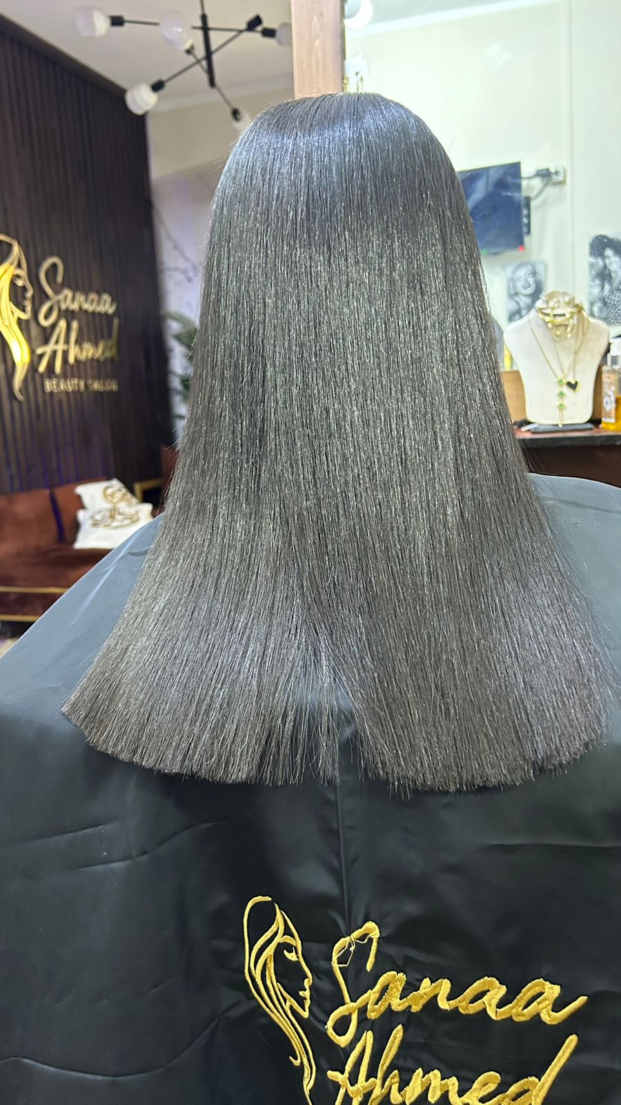 Smooth black hair treatment final result at Sanaa Ahmed Beauty Salon Third Settlement
