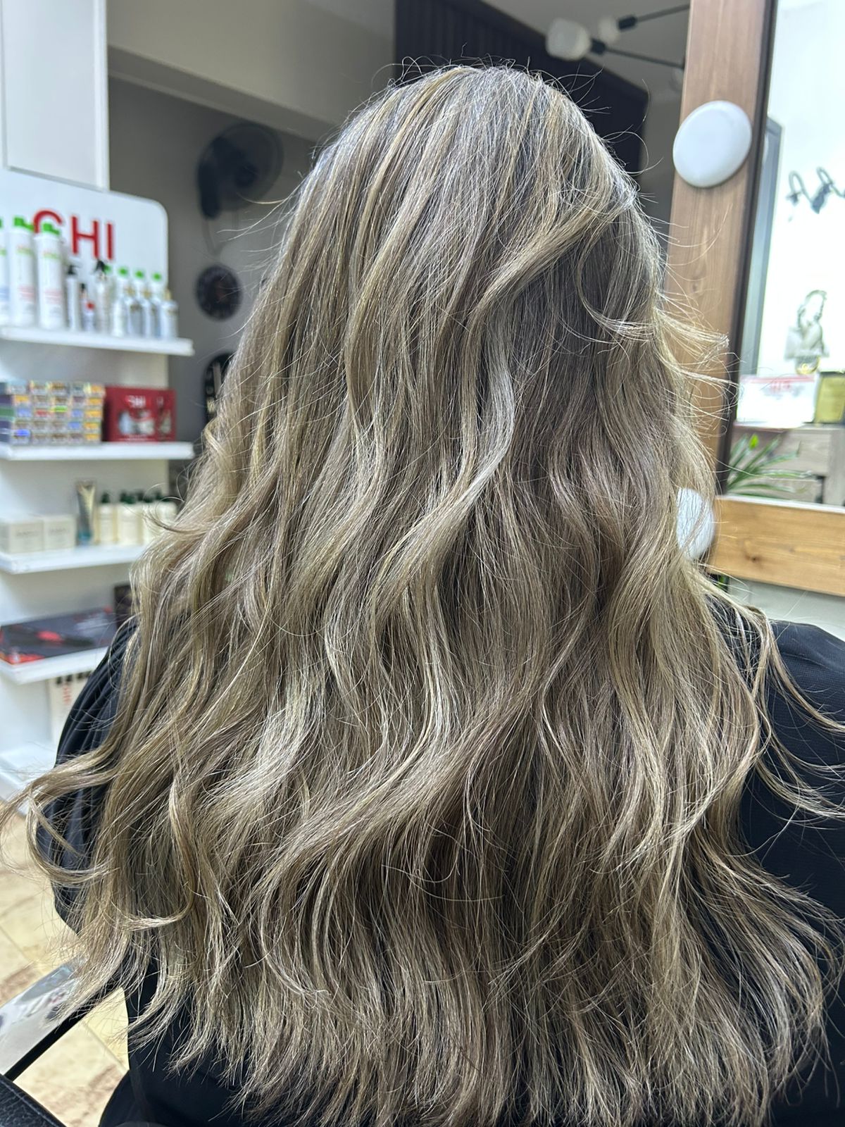 Blonde highlight hair result at Sanaa Ahmed Beauty Salon women-only salon New Cairo