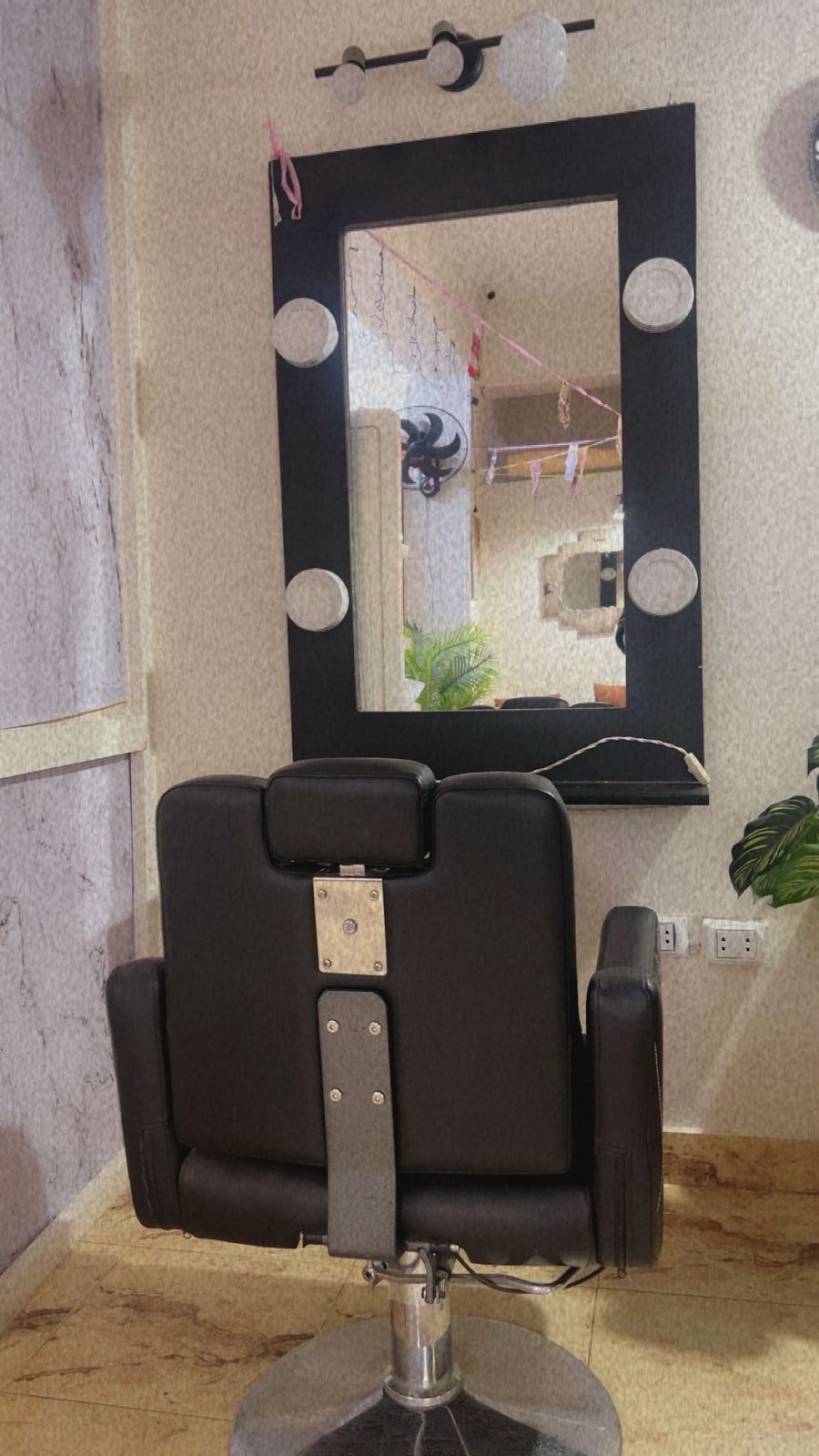 Hair styling chairs and mirrors at Sanaa Ahmed Beauty Salon near Dyar and Platinum Club, New Cairo